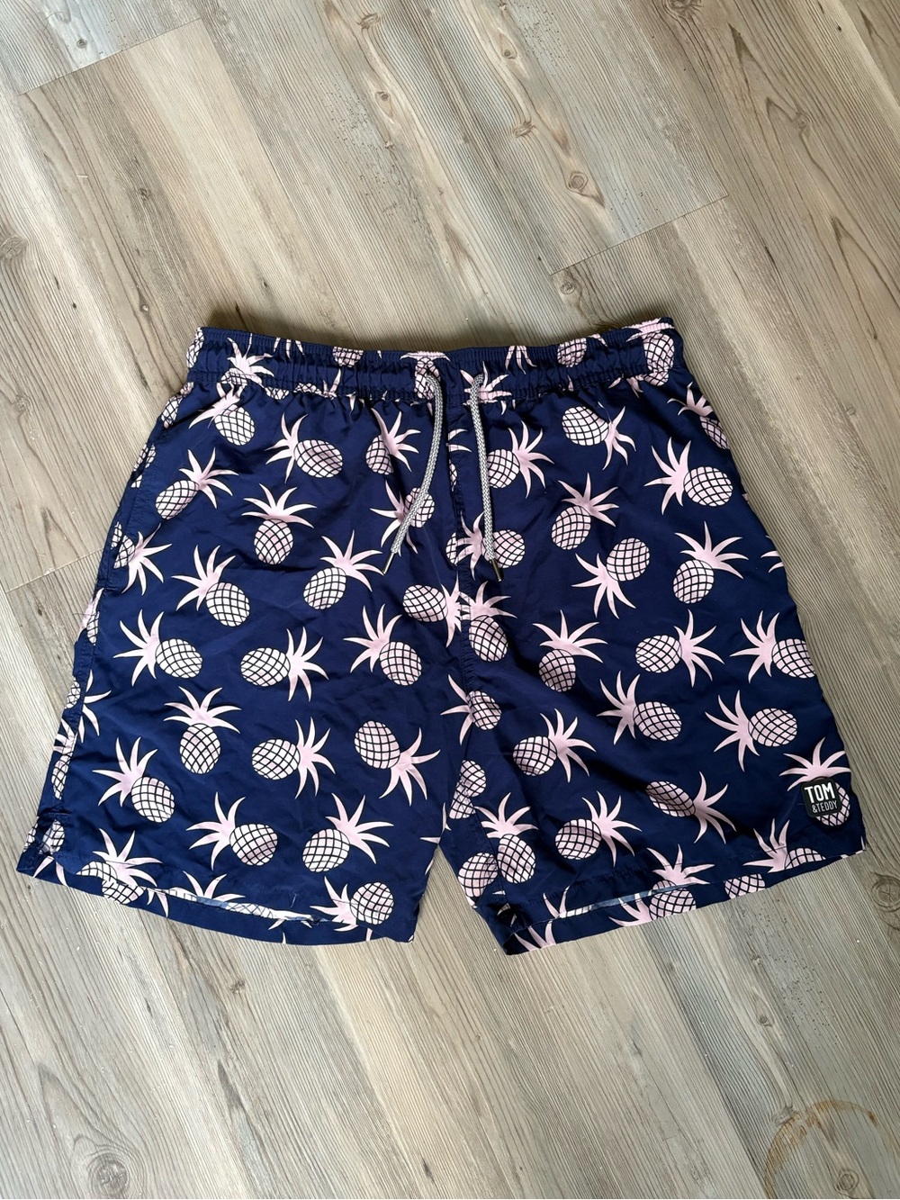 Tom & Teddy Navy Swim Trunks with Pink Pineapple Print